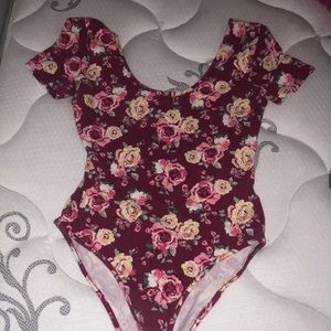 Flower print off the shoulder body suit
